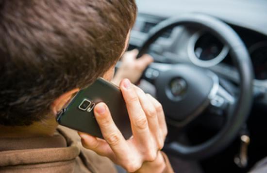 Photograph of Any Use Of Hand-held Mobile Phone While Driving To Become Illegal
