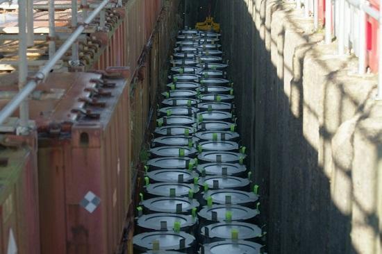 Photograph of Collaborative Project Safely Disposing Of Over 1,000 Drums Of Radioactive Waste Completes